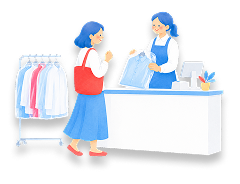 クリーニング店の受付でお客様と店員が笑顔で応対しているイラスト